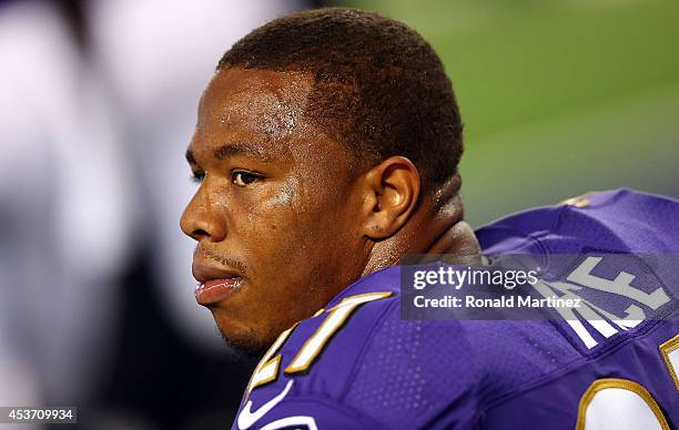 Ray Rice of the Baltimore Ravens sits on the bench against the Dallas Cowboys in the first half of their preseason game at AT&T Stadium on August 16,...