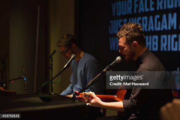 Gus Unger Hamilton and Joe Newman of Alt-J perform an EndSession during Deck the Hall Ball hosted by 107.7 The End at KeyArena on December 3, 2013 in...