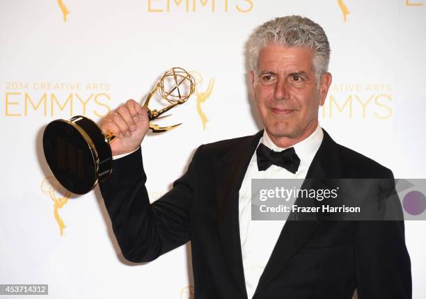 Personality Anthony Bourdain poses in the press room during the 2014 Creative Arts Emmy Awards at Nokia Theatre L.A. Live on August 16, 2014 in Los...