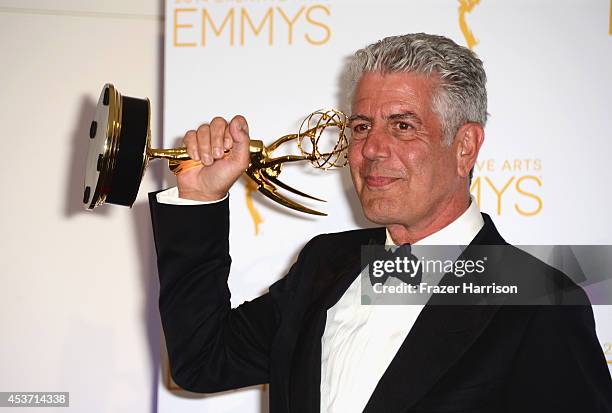 Personality Anthony Bourdain poses in the press room during the 2014 Creative Arts Emmy Awards at Nokia Theatre L.A. Live on August 16, 2014 in Los...