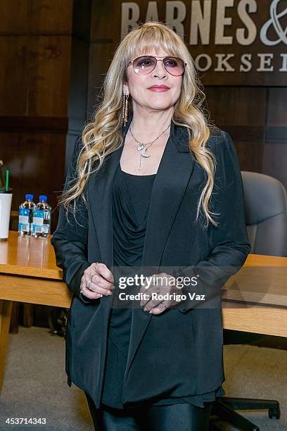 Singer Stevie Nicks signs "In Your Dreams" at Barnes & Noble bookstore at The Grove on December 4, 2013 in Los Angeles, California.