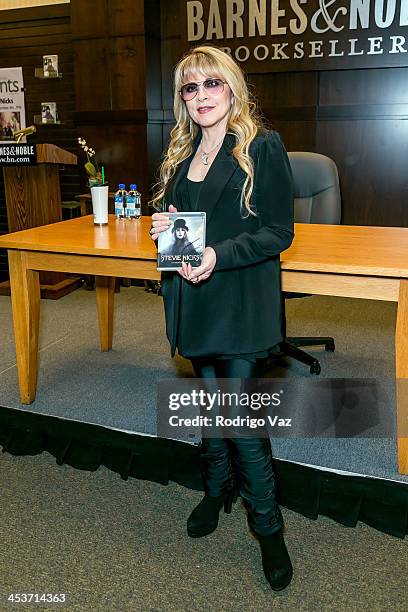 Singer Stevie Nicks signs "In Your Dreams" at Barnes & Noble bookstore at The Grove on December 4, 2013 in Los Angeles, California.