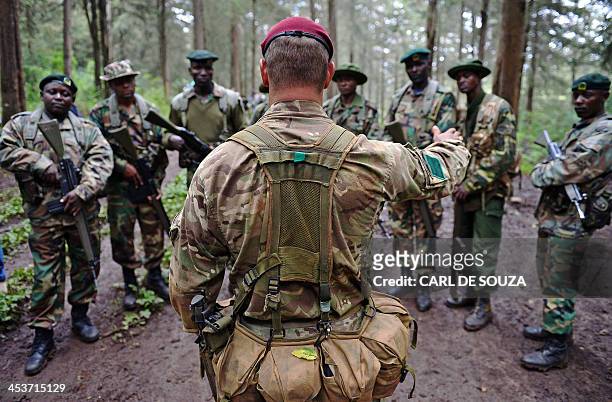 British Elite Paratrooper, 3rd battalion Parachute regiment , Corporal Andy Smith instructs Kenya Wildlife and Forest Services rangers during an...