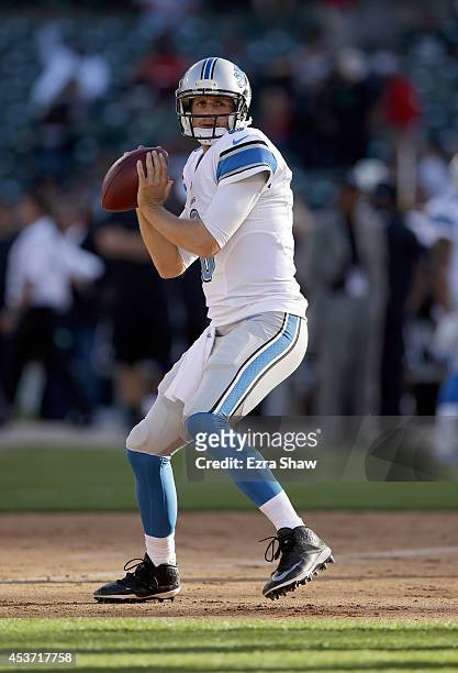 Dan Orlovsky of the Detroit Lions warms up before their preseason game against the Oakland Raiders at O.co Coliseum on August 15, 2014 in Oakland,...