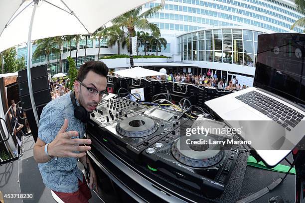 Obscene performs at Mackapoolooza at Fontainebleau Miami Beach on August 16, 2014 in Miami Beach, Florida.