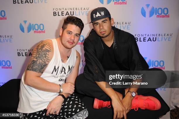 Mack and Afrojack attend Mackapoolooza at Fontainebleau Miami Beach on August 16, 2014 in Miami Beach, Florida.