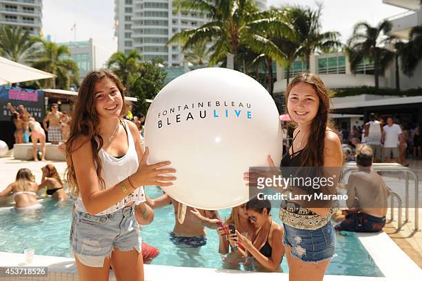 Guests attend Mackapoolooza at Fontainebleau Miami Beach on August 16, 2014 in Miami Beach, Florida.