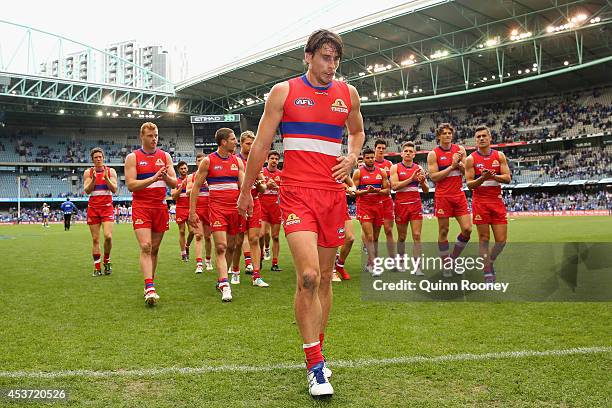 Ryan Griffen of the Bulldogs walks off the field in his 200th game during the round 21 AFL match between the North Melbourne Kangaroos and the...