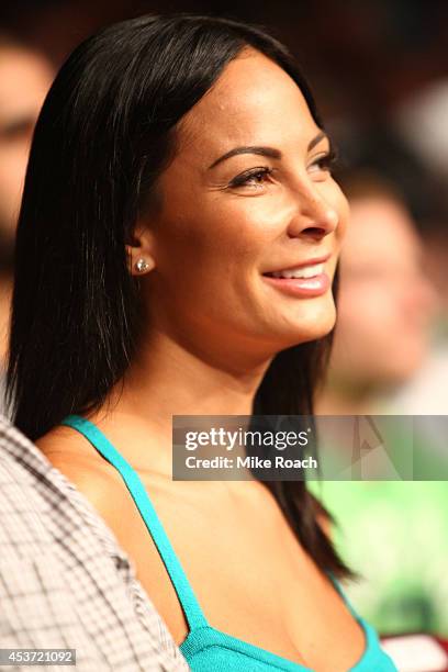 Kenda Perez sits Octagonside during the UFC fight night event at the Cross Insurance Center on August 16, 2014 in Bangor, Maine.