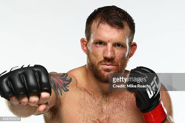 Ryan Bader poses for a post-fight portrait backstage during the UFC fight night event at the Cross Insurance Center on August 16, 2014 in Bangor,...