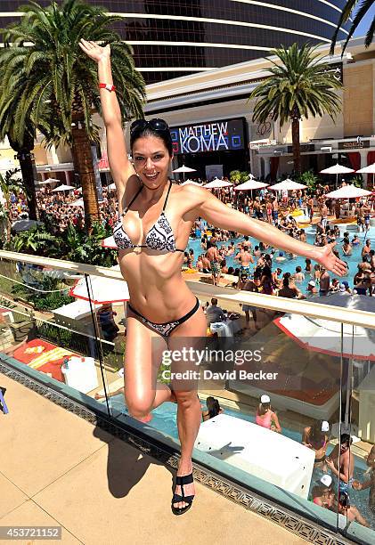 Model Adrianne Curry appears at the Encore Beach Club at Wynn Las Vegas on August 16, 2014 in Las Vegas, Nevada.