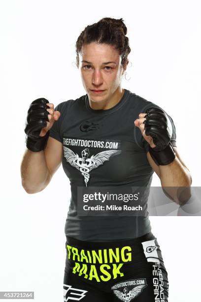 Sara McMann poses for a post-fight portrait backstage during the UFC fight night event at the Cross Insurance Center on August 16, 2014 in Bangor,...