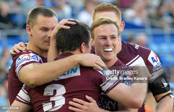 Daly Cherry-Evans of the Sea Eagles celebrates with Jamie Lyon but their joy is short lived after the try is disallowed during the round 23 NRL match...