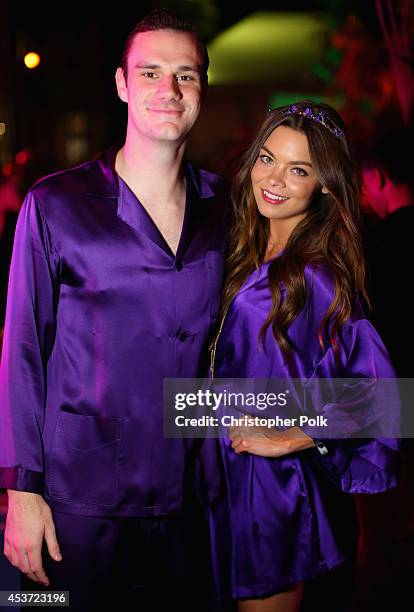 Cooper Hefner and actress Scarlettt Byrne attend the Annual Midsummer Night's Dream Party at the Playboy Mansion hosted by Hugh Hefner on August 16,...