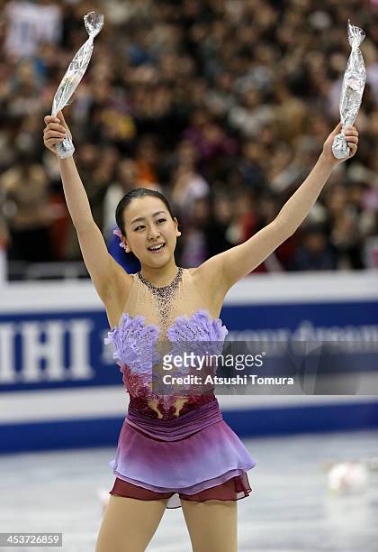 Mao Asada of Japan reacts after the ladies's short program during day one of the ISU Grand Prix of Figure Skating Final 2013/2014 at Marine Messe...