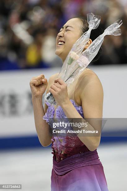 Mao Asada of Japan reacts after the ladies's short program during day one of the ISU Grand Prix of Figure Skating Final 2013/2014 at Marine Messe...