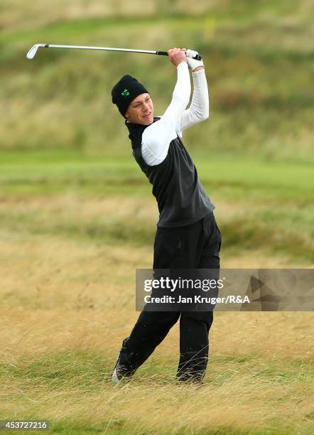 Rowan Lester of Ireland plays an approach shot in his match play final against Oskar Bergqvist of Sweden during the Boys Amateur Championship at...