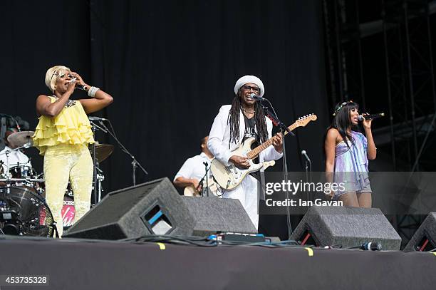 Kimberly Davis, Nile Rodgers and Folami Ankoanda-Thompson of 'Chic' performs on the Virgin Media during Day 2 of the V Festival at Hylands Park on...