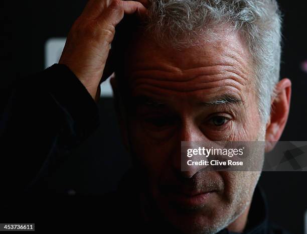 John McEnroe looks on during a press interview on day two of the Statoil Masters Tennis at the Royal Albert Hall on December 5, 2013 in London,...