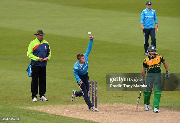 Karl Carver of England bowls during the ODI Series 2014 match between England U19's and South Africa U19's at Trent Bridge on August 17, 2014 in...