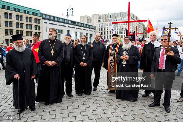 Priest of several christian groups attend a rally as more then thousand participants of several oriental christian groups gather to protest against...