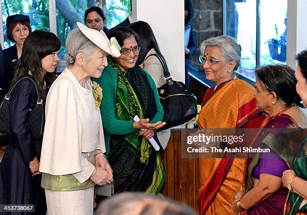 Japan's Empress Michiko speaks with the members of the International Board on Books for Young People on December 3, 2013 in New Delhi, India. The...