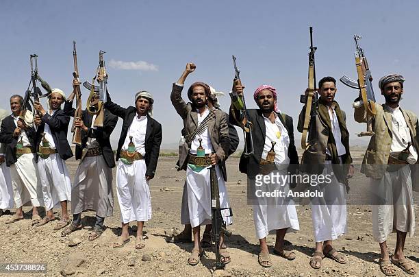 Group of armed Yemeni tribe member gather to protest Al-Qaeda in Beni Harith, north-east of Sana, Yemen, on August 17, 2014. Armed Yemeni members...