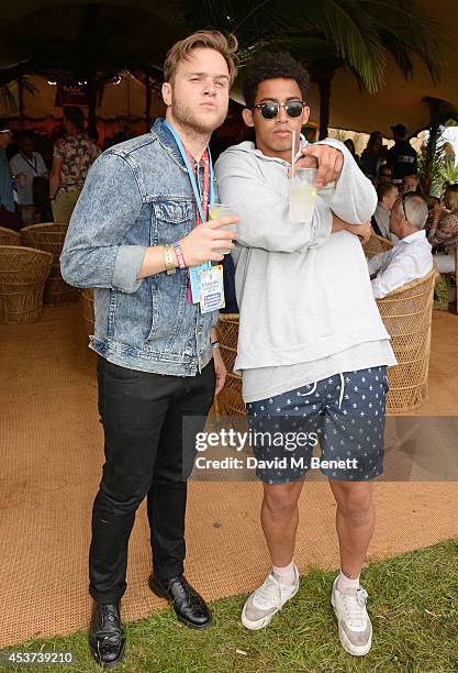 Olly Murs and Jordan Stephens attend the Mahiki Rum Bar for the launch of the Mahiki Rum Family backstage during day 2 of the V Festival 2014 at...