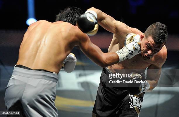 Gabe Duluc and Kendo Castaneda trade blows during their junior welterweight fight at the inaugural event for BKB, Big Knockout Boxing, at the...