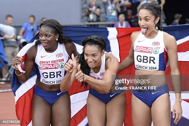 Great Britain's Asha Philip, Great Britain's Ashleigh Nelson and Great Britain's Jodie Williams celebrate after winning in the Women's 4x100m final...