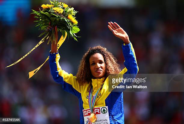 Gold medalist Meraf Bahta of Sweden stands on the podium during the medal ceremony for the Women's 5000 metres final during day six of the 22nd...