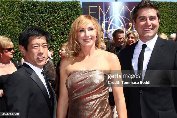 Personalities Grant Imahara, Kari Byron and Tory Belleci attend the 2014 Creative Arts Emmy Awards held at the Nokia Theatre L.A. Live on August 16,...