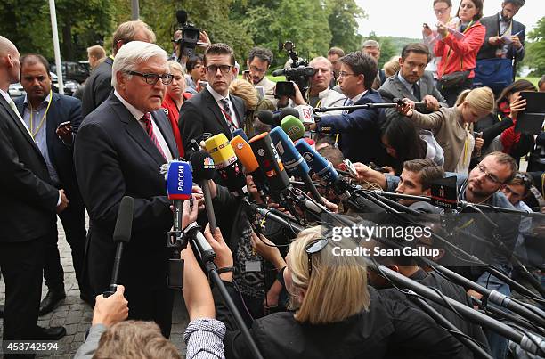 German Foreign Minister Frank-Walter Steinmeier gives statements to the media prior to talks with Russian Foreign Minister Sergey Lavrov, Ukrainian...