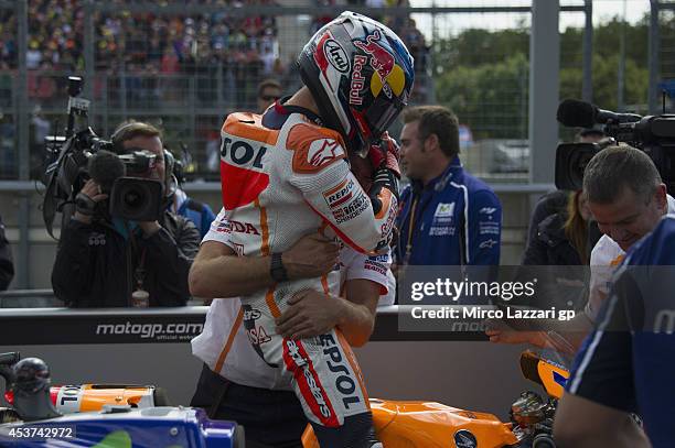 Dani Pedrosa of Spain and Repsol Honda Team celebrates the victory with mechanic at the end of the MotoGP race during the MotoGp of Czech Republic -...