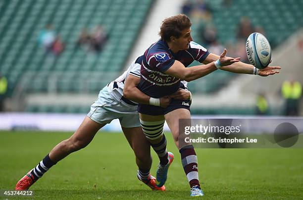 Segundo Taculet of Buenos Aires is tackled by Mitch Karpik of Auckland during the Cup Final match between Buenos Aires and Auckland during the World...