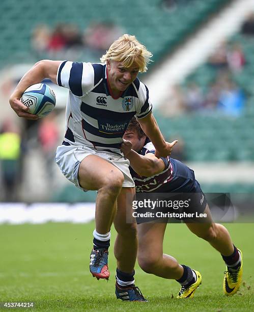 Mitch Karpik of Auckland gets away from Tobias Moyano of Buenos Aires during the Cup Final match between Buenos Aires and Auckland during the World...