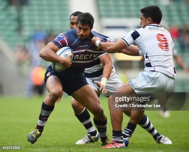 Joaquin Paz of Buenos Aires battles with Kali Hala of Auckland during the Cup Final match between Buenos Aires and Auckland during the World Club 7's...