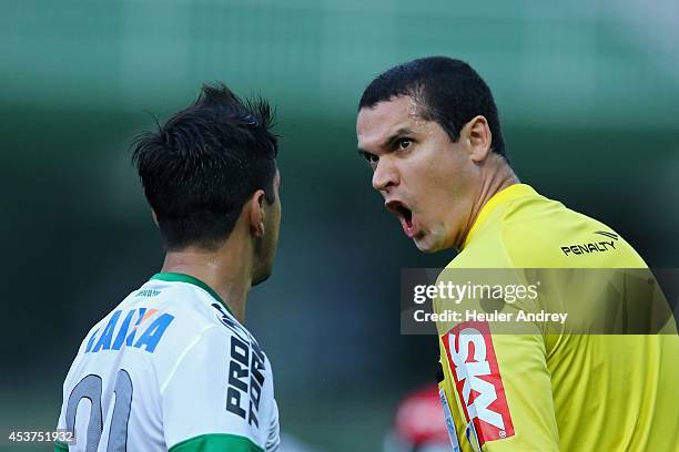 Robinho of Coritiba and referee Ricardo Marques Ribeiro during the match between Coritiba and Flamengo for the Brazilian Series A 2014 at Couto...