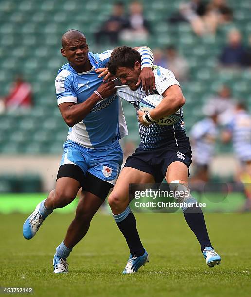 Luke Morgan of Cardiff battles with Ganfried May of Blue Bulls during the Plate Trophy Final match between Cardiff Blues and Vodacom Blue Bulls...