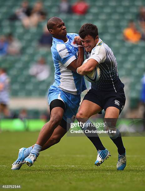 Luke Morgan of Cardiff battles with Ganfried May of Blue Bulls during the Plate Trophy Final match between Cardiff Blues and Vodacom Blue Bulls...