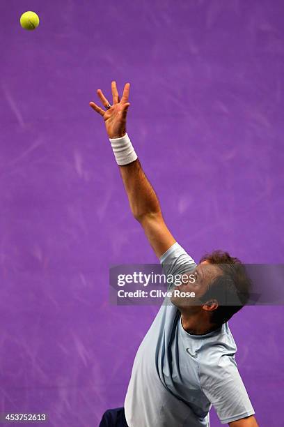 Greg Rusedski of Great Britain in action during his group match against Pat Rafter of Australia on day two of the Statoil Masters Tennis at the Royal...