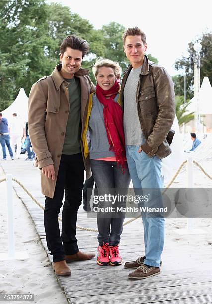 Milos Vukovic, Maria Kempken, Timothy Boldt attend the Land Rover Public Chill 2014 at km689 on August 17, 2014 in Cologne, Germany.