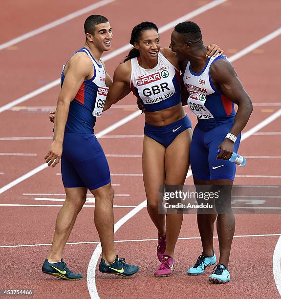 Adam Gemili and Harry Aikines-Aryeetey celebrate with Ashleigh Nelson of Great Britain after her team wins the Women's 4x100 metres relay final...