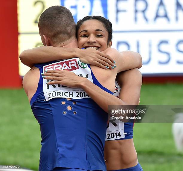 Richard Kilty of Great Britain celebrates with Ashleigh Nelson of Great Britain after her team wins the Women's 4x100 metres relay final during day...