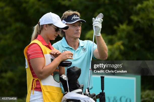 Bernhard Langer of Germany waits to tee off on the 16th hole during the final round of the Champions Tour Dick's Sporting Goods Open at En-Joie Golf...