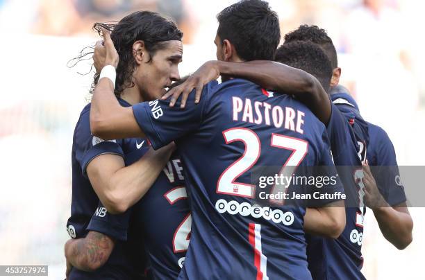 Edinson Cavani of PSG celebrates scoring the 2nd goal with teammates during the French Ligue 1 match between Paris Saint Germain FC and SC Bastia at...