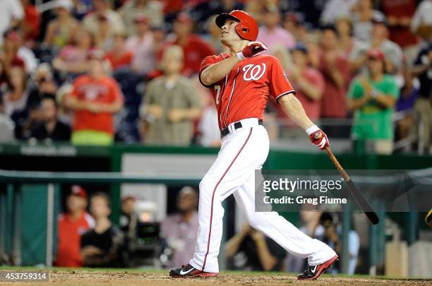 Scott Hairston of the Washington Nationals hits a sacrifice fly to drive in the game-winning run in the 11th inning against the Pittsburgh Pirates at...