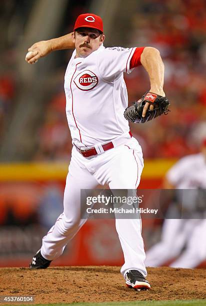 Sam LeCure of the Cincinnati Reds pitches during the game against the Miami Marlins at Great American Ball Park on Aug 9, 2014 in Cincinnati, Ohio.