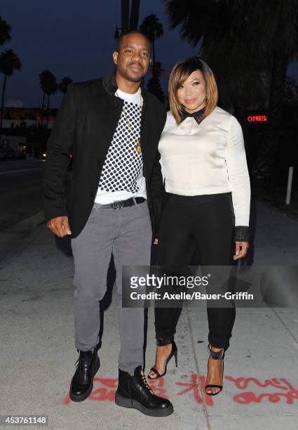 Duane Martin and actress Tisha Campbell attend Vivica A. Fox's 50th birthday celebration at Philippe Chow on August 2, 2014 in Beverly Hills,...