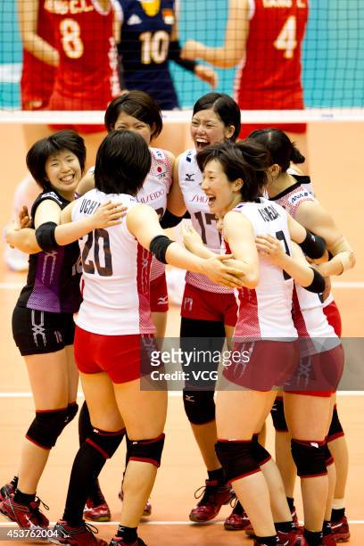 Japan Women's National Volleyball Team cheers for the winning in the FIVB World Grand Prix on August 17, 2014 in Macau, China.